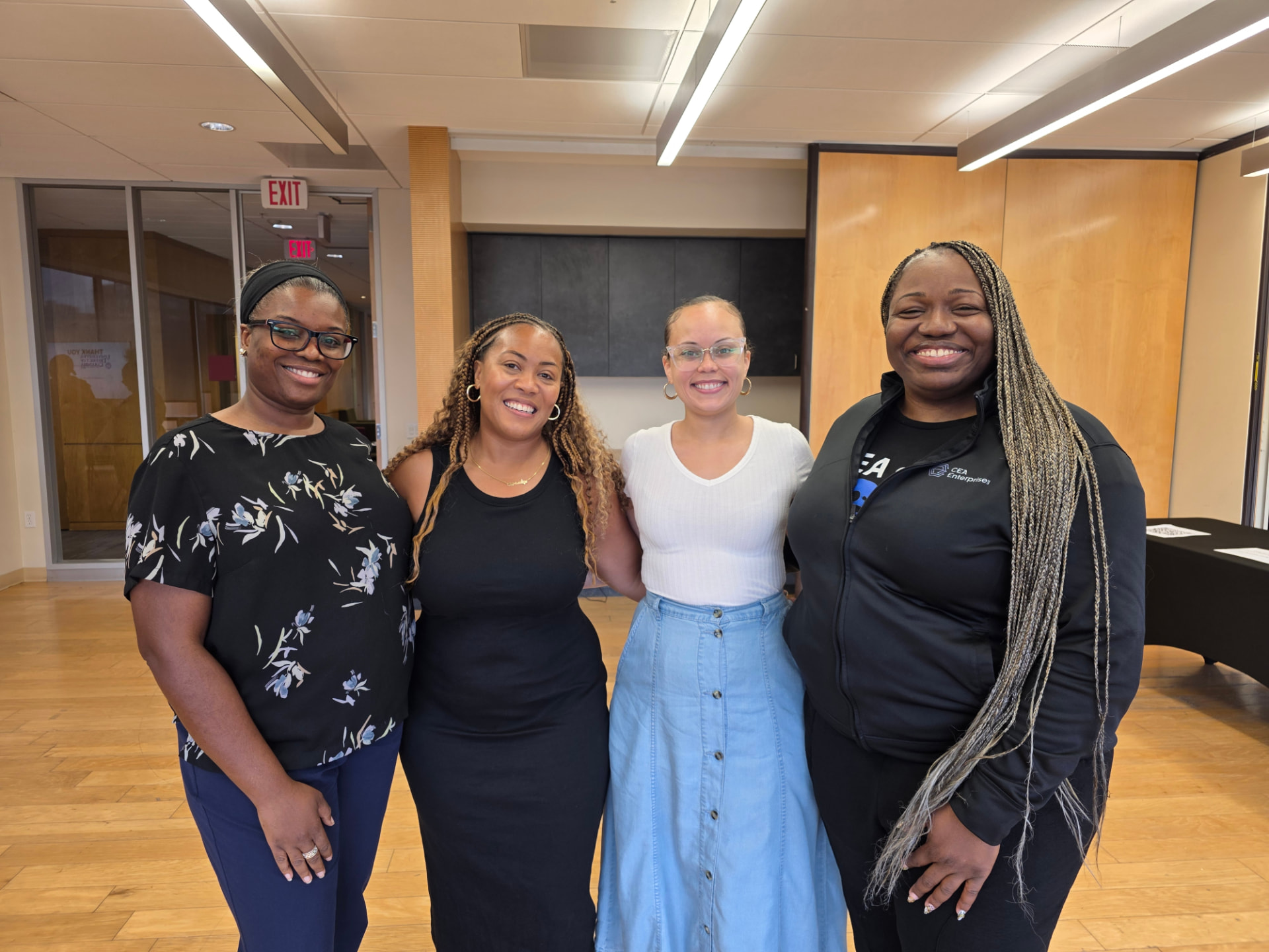 Jasmine K. Hicks with partner team members after a community workshop